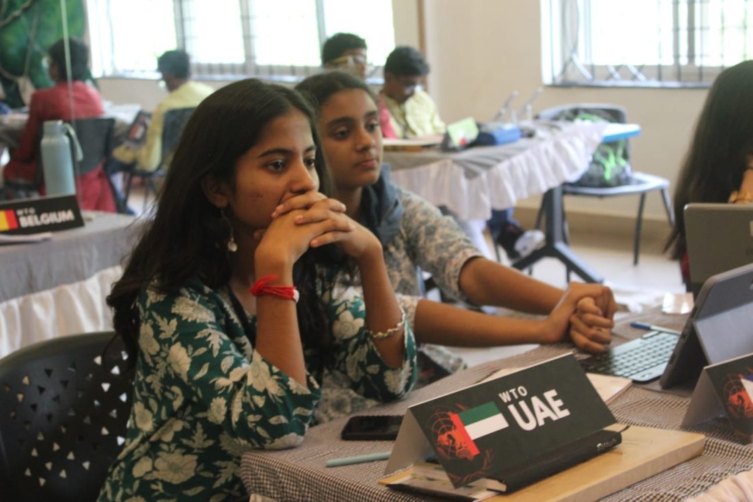 WTO delegates at their desk